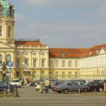 At a crossing in front of a palace