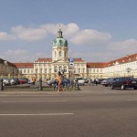 At a crossing in front of a palace