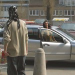 In a residential area and at a bus station