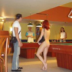 At a small billiard bar