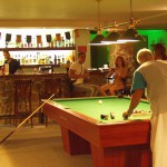At a small billiard bar