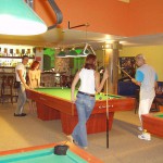 At a small billiard bar