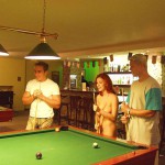 At a small billiard bar