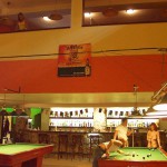 At a small billiard bar