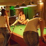 At a small billiard bar