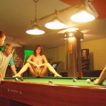 At a small billiard bar