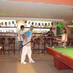 At a small billiard bar