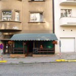 Inside and in font of small bar