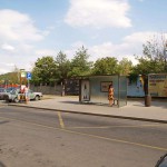 At a bus stop and at a kiosk