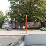 At a bus stop and at a kiosk