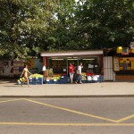 At a bus stop and at a kiosk