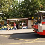 At a bus stop and at a kiosk