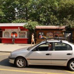 At a bus stop and at a kiosk