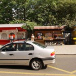 At a bus stop and at a kiosk