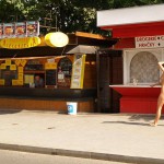 At a bus stop and at a kiosk