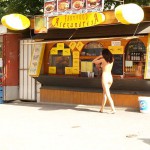 At a bus stop and at a kiosk