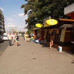 At a bus stop and at a kiosk