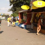At a bus stop and at a kiosk