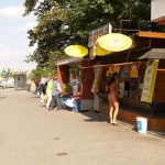 At a bus stop and at a kiosk