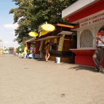 At a bus stop and at a kiosk