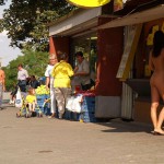 At a bus stop and at a kiosk