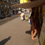 At a bus stop and at a kiosk