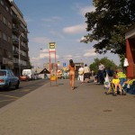 At a bus stop and at a kiosk