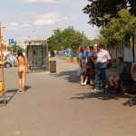 At a bus stop and at a kiosk