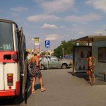 At a bus stop and at a kiosk