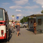 At a bus stop and at a kiosk