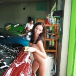 In a garage with a washing bay