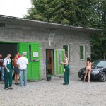 In a garage with a washing bay