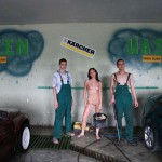 In a garage with a washing bay