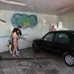 In a garage with a washing bay