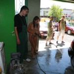 In a garage with a washing bay