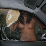 In a garage with a washing bay