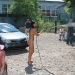 In a garage with a washing bay