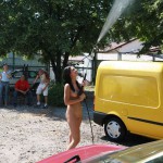 In a garage with a washing bay