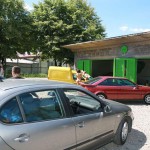 In a garage with a washing bay
