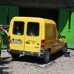In a garage with a washing bay