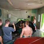 In a garage with a washing bay