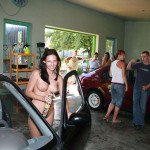 In a garage with a washing bay