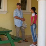Handing out beers to construction workers