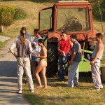 Handing out beers to construction workers