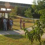 Handing out beers to construction workers