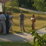 Handing out beers to construction workers