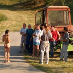 Handing out beers to construction workers