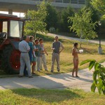 Handing out beers to construction workers