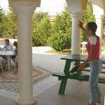 Handing out beers to construction workers