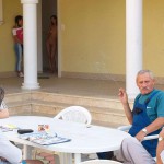 Handing out beers to construction workers